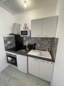 Le Bohème - Centre Ville, Netflix et WIFI, parking, idéal familles, couples et voyages daffaire