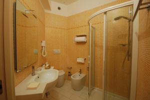 Room with One Queen Bed and Two Single Beds - Non-Smoking