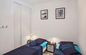 Appartements Casa Estel - Blue apartment in downtown of Erbalunga : photos des chambres