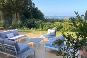 Villas Villa 180 m2 vue Mer Piscine Climatisee Grand jardin 5000 m2 cloture Calme : photos des chambres