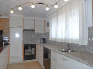 Apartment Chalet Almis 5 by Interhome