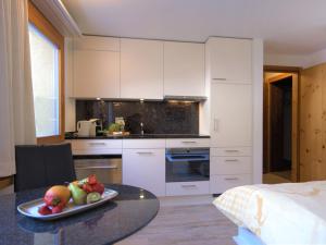 Apartment Chesa Munteratsch 311 by Interhome