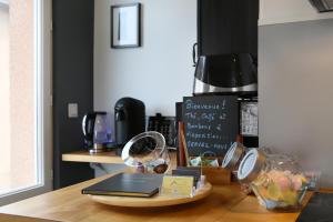 Appartements expat renting - Le Houdini - Confort et Evasion : photos des chambres