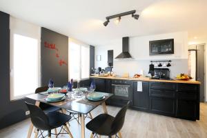 Appartements expat renting - Le Houdini - Confort et Evasion : photos des chambres