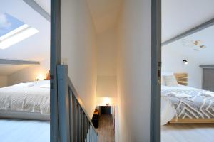 Appartements expat renting - Le Houdini - Confort et Evasion : photos des chambres