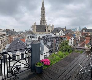 Duplex dernier étage avec terasse à deux pas de la grand place