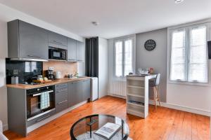 Appartements LE COCON #Centre ville #100m de la Charente : photos des chambres