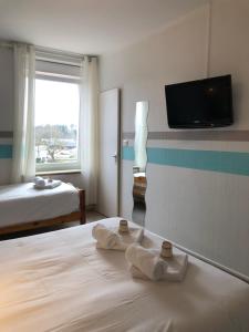 Enzo Hotels Neufchateau by Kyriad Direct : photos des chambres