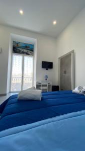 Chambre Double avec Balcon (2 Adultes + 1 Enfant)