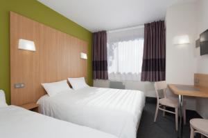 Hotels B&B HOTEL Nimes Ville Active, parking securise gratuit : photos des chambres