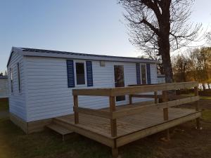 Campings Mobil-home, hotelier, tente safari wood lodge : photos des chambres