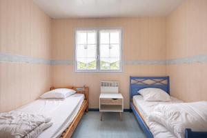 Maisons de vacances Venez decouvrir cette maison familiale de 100m2 situee a Lacanau, detente garantie : photos des chambres