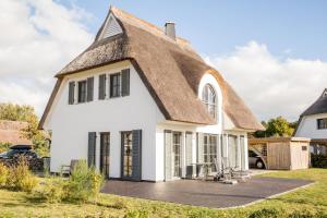 Ferienhaus Schilfrohrsaenger 54