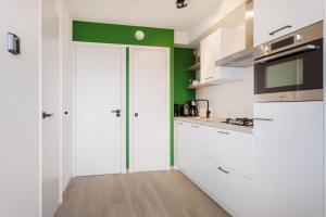 Welcome in - Beneden appartement direct aan het Sneekermeer met tuin