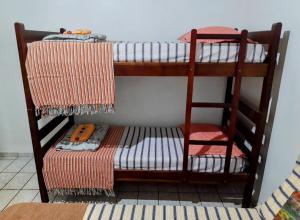 Suíte Pé na Areia- Espaço Independente na Praia do Curral com localização privilegiada - simplicidade e comodidade com o pôr do sol mais lindo de Ilhabela - melhor custo benefício para até 4 pessoas , na Av José Pacheco do Nascimento nº 768