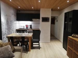 Appartements Les Deux Alpes, Le Lauvitel, appartement cosy, pied des pistes, 2 adultes 2 enfants : photos des chambres