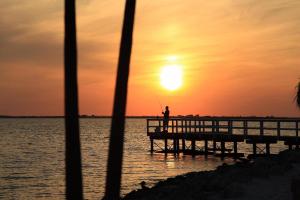 2 Bed Condo with Balcony Facing Pool and Sunsets!