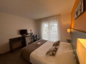 Hotels Logis L'Espadon : photos des chambres