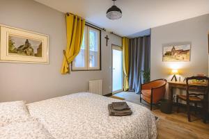 Hotels Suites Saint Brice : photos des chambres