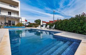 Awesome apartment in Tribunj with Outdoor swimming pool and 2 Bedrooms