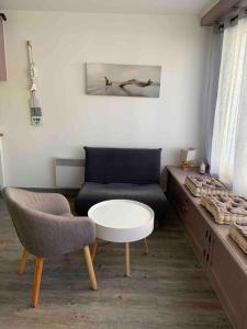 Maisons de vacances Plage et commerces a 50m, sans tele pour deconnecter ! : photos des chambres