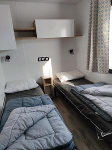 Campings Assist' Mobil home 363 - Charmant mobil home 8 personnes 3 chambres : photos des chambres