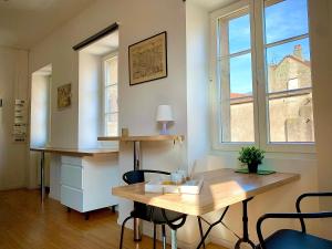 Les Fabuleux appartements du Coeur de ville - Place Victor Hugo : photos des chambres
