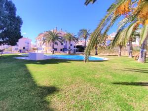 Bajo con terraza, parking y piscina en el centro PORTA MEDITERRANEA ALBERT VILLAS
