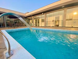 Casa Temporada Paris Thermas dos Laranjais3-Suites