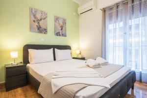 One-Bedroom Apartment room in Erythros Boutique Suite By Cloudkeys