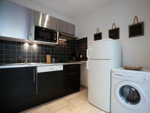 Appartements Les cles de la Cite : photos des chambres