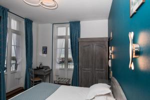 Hotels Hotel De Calais : photos des chambres