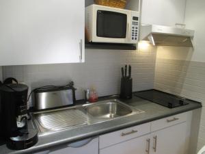 Appartements Cosy studio au coeur du triangle d'or : photos des chambres