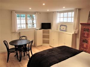 Appartements Cosy studio au coeur du triangle d'or : photos des chambres