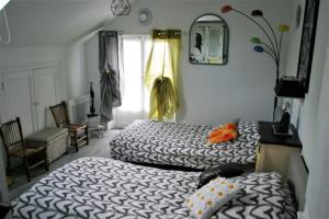 B&B / Chambres d'hotes Les petites Mirabelles : photos des chambres