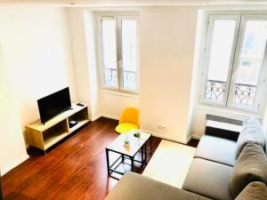 Appartements Suites Rive Gauche - Chez Nolan : photos des chambres