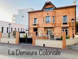 Hotels Hotel La Demeure Coloniale : photos des chambres