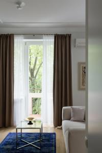 Design Studio Apartment with Balcony by Domvia