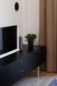 Design Studio Apartment with Balcony by Domvia