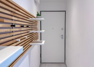 NUOVO BILOCALE IN CENTRO CON TERRAZZO E POSTO AUTO