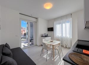 NUOVO BILOCALE IN CENTRO CON TERRAZZO E POSTO AUTO