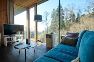 Design Apartment mit Panoramafenster - Wald und Seeblick - Ruhe nahe der Stadt