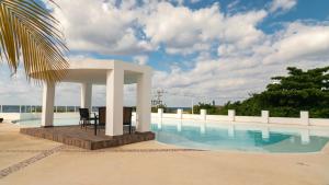 Confortable casa en Cozumel, Condominio con vista al mar # 28