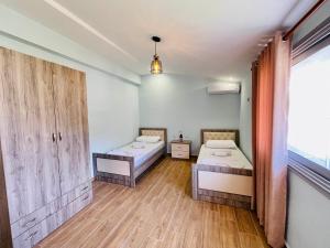 Jico Travel - Astera Apartments