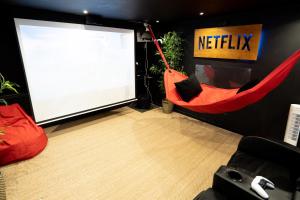 Appartements Capsule movie avec Balneo home cinema playstation 5 : photos des chambres