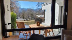 Bungalow mit Terrasse im alpinen Stil