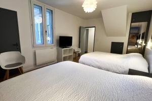 Appartements Paris Plage Vacances - Sublime loft en plein coeur du centre ville : photos des chambres