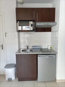 Appartements Residence de la Source by Euclenima : photos des chambres