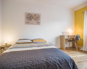 Appartements Happy House - Centre Ville - Parking Gratuit : photos des chambres