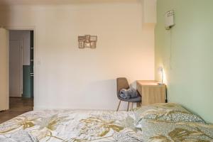 Appartements Happy House - Centre Ville - Parking Gratuit : photos des chambres